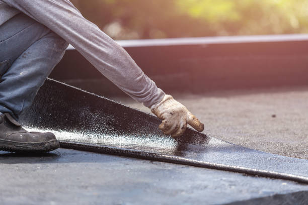 Professional Waterproofing technician working in Cookeville, TN